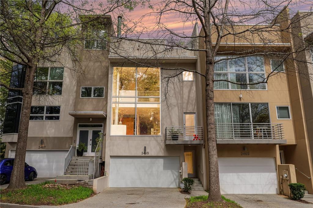 a front view of a building with glass windows