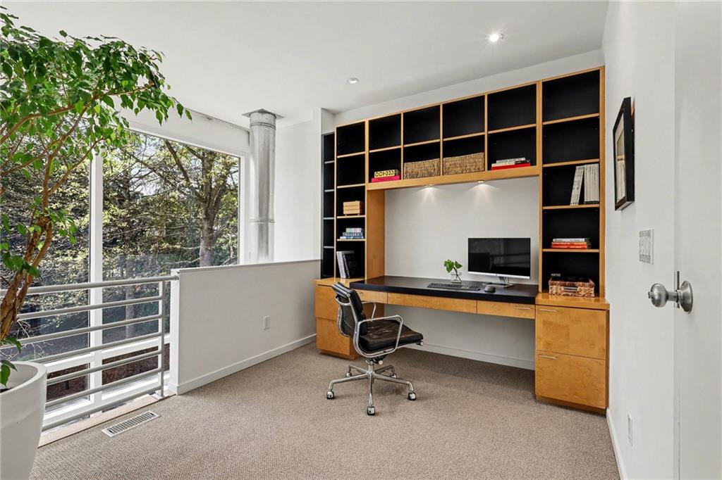 2465 Field Way Atlanta, GA 30319 - Photo 19 of 40 a view of a workspace with furniture and a window
