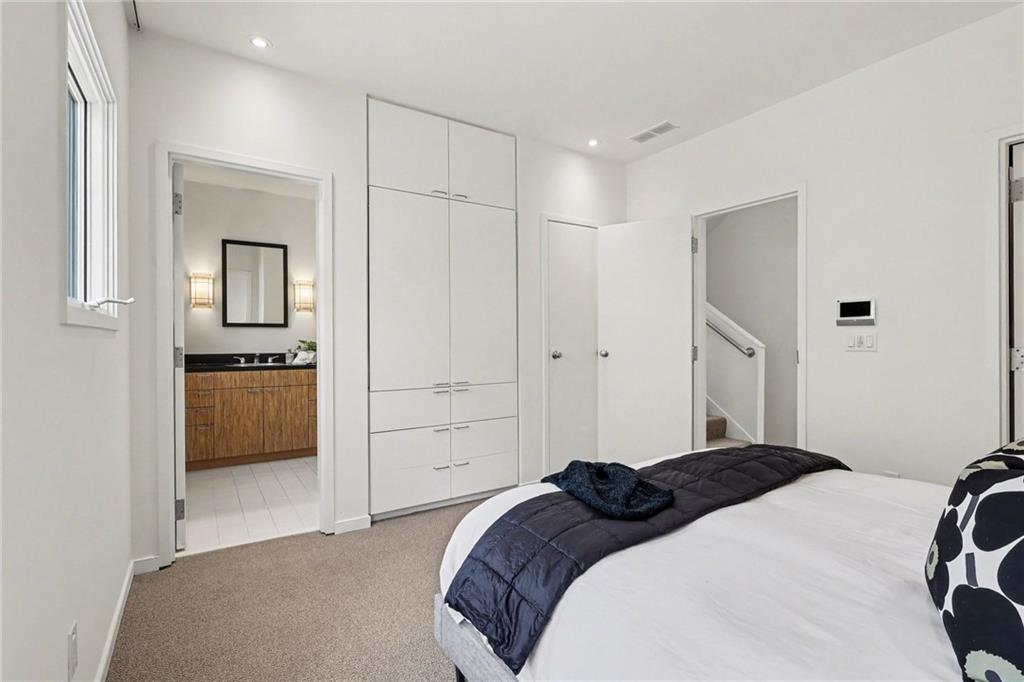 2465 Field Way Atlanta, GA 30319 - Photo 26 of 40 a bedroom with a bed and a closet