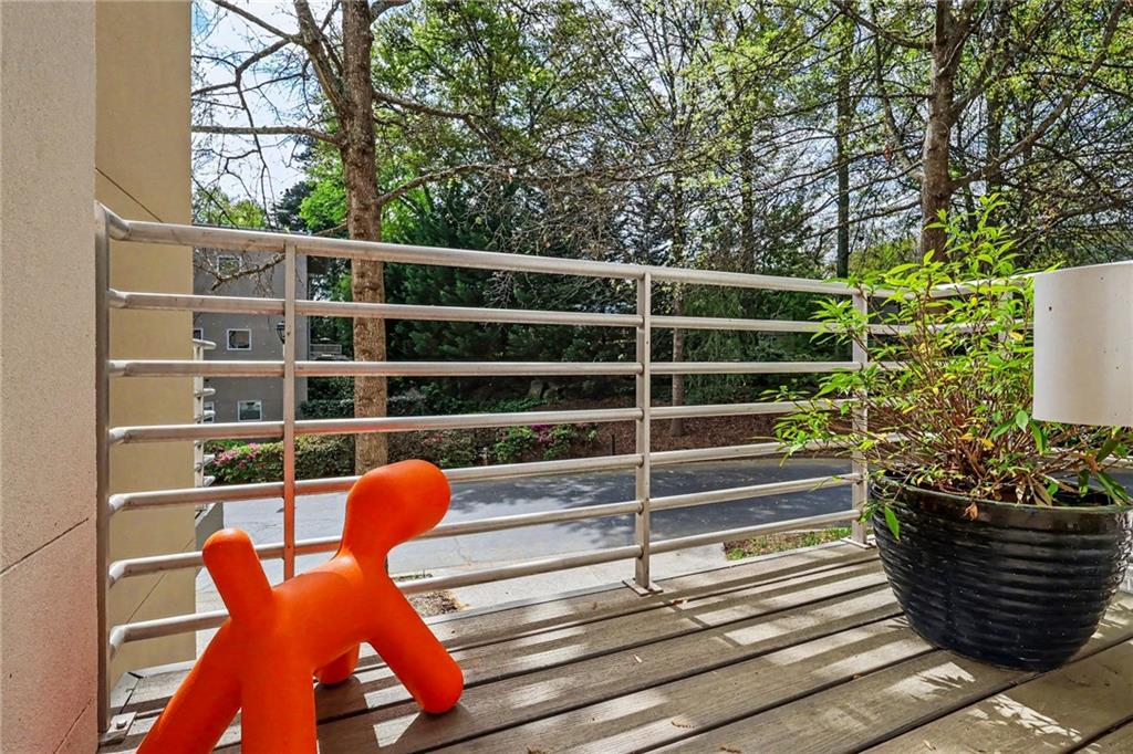 2465 Field Way Atlanta, GA 30319 - Photo 33 of 40 a view of a chairs and table in the wooden floor