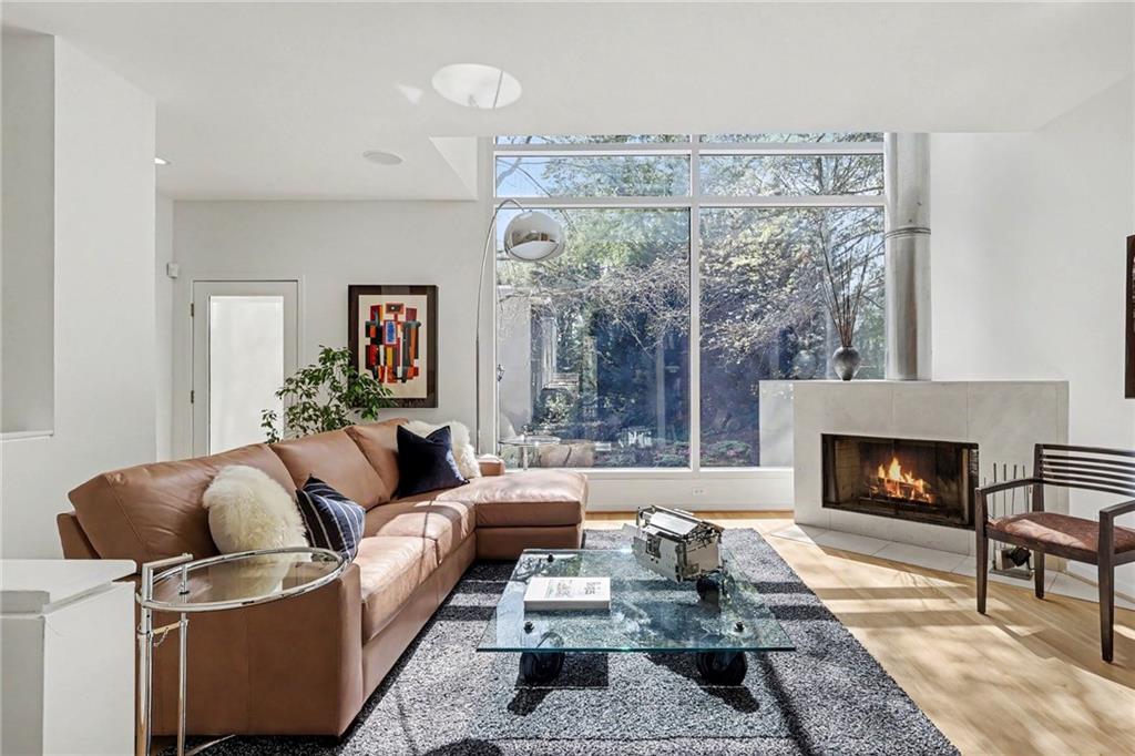 2465 Field Way Atlanta, GA 30319 - Photo 4 of 40 a living room with furniture and a fireplace