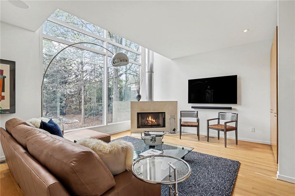2465 Field Way Atlanta, GA 30319 - Photo 5 of 40 a living room with furniture fireplace and a flat screen tv