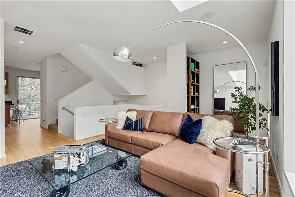 2465 Field Way Atlanta, GA 30319 - Photo 7 of 40 a living room with furniture and wooden floor