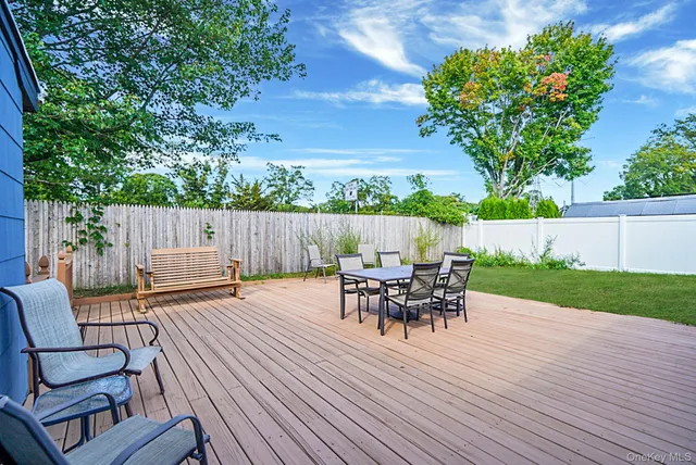 a view of a table and chairs in the patio