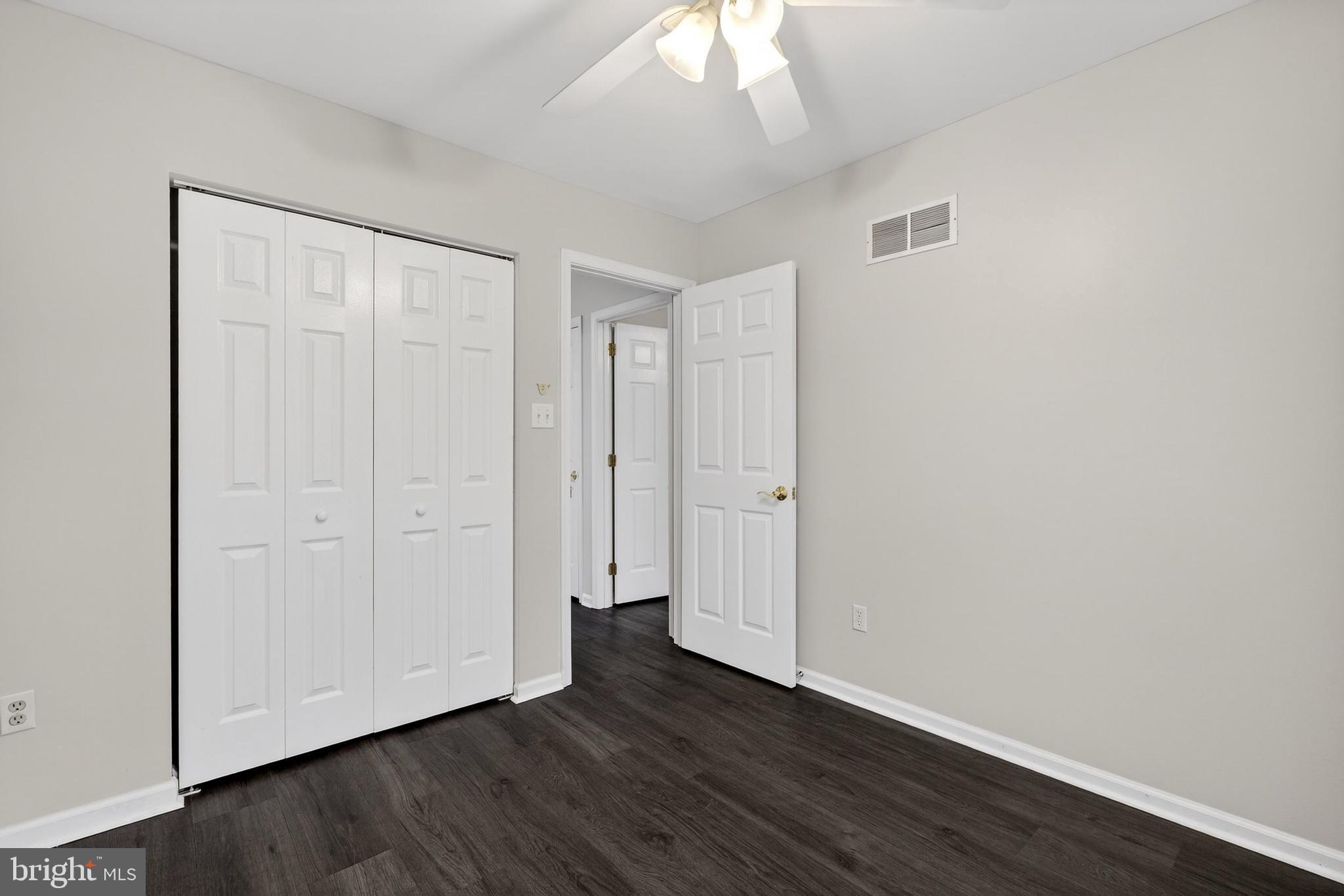 613 Candlestick Lane Newark, DE 19702 - Photo 15 of 33 a view of an empty room with wooden floor