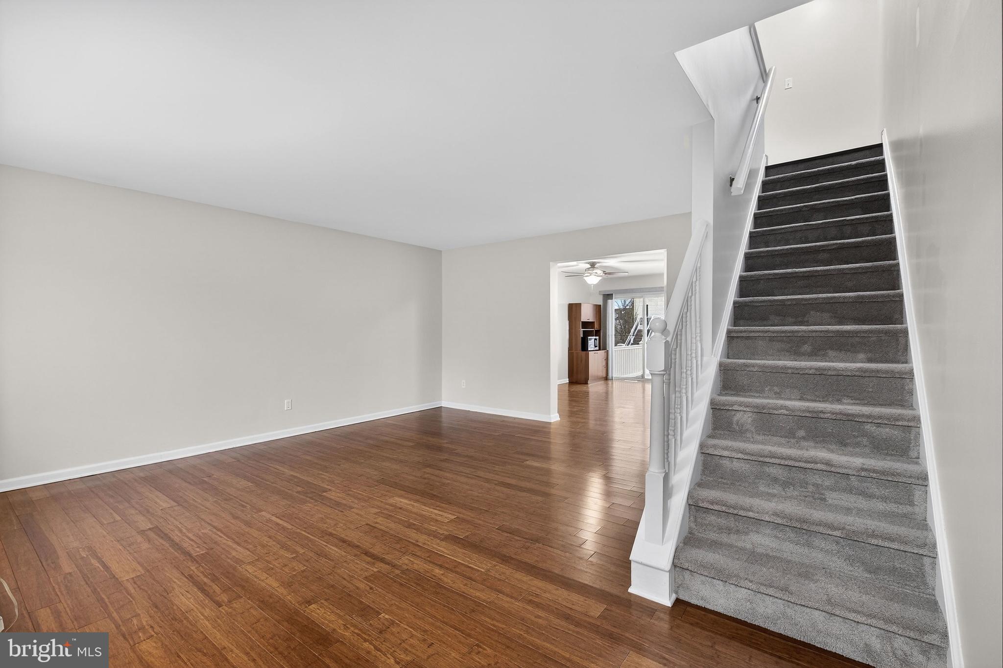 613 Candlestick Lane Newark, DE 19702 - Photo 4 of 33 a view of entryway and hall with wooden floor
