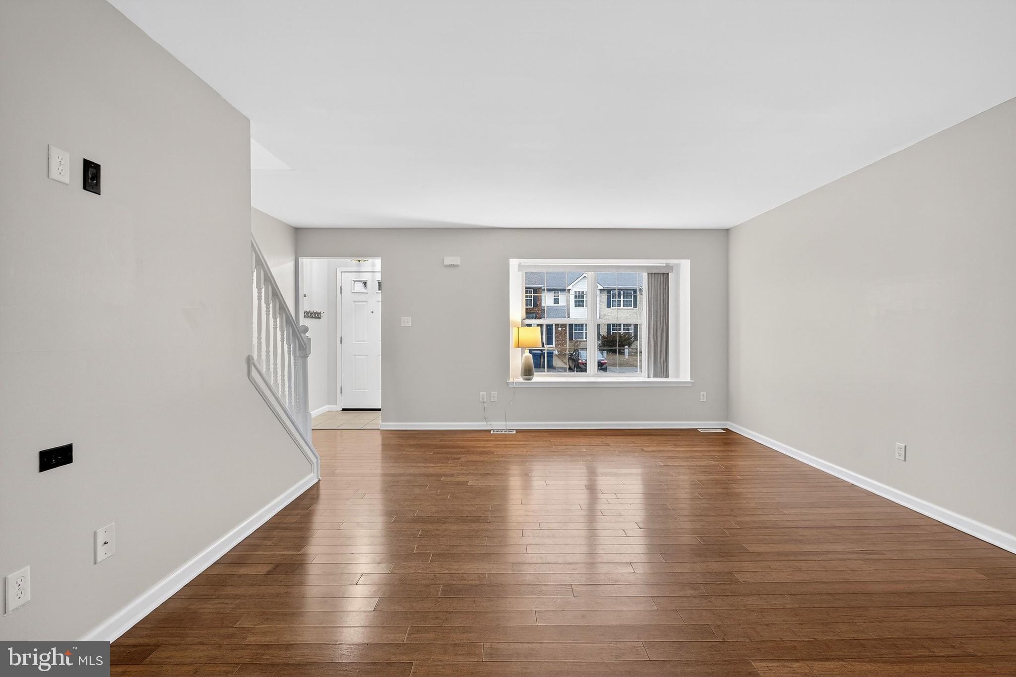 613 Candlestick Lane Newark, DE 19702 - Photo 6 of 33 a view of empty room with wooden floor and fan