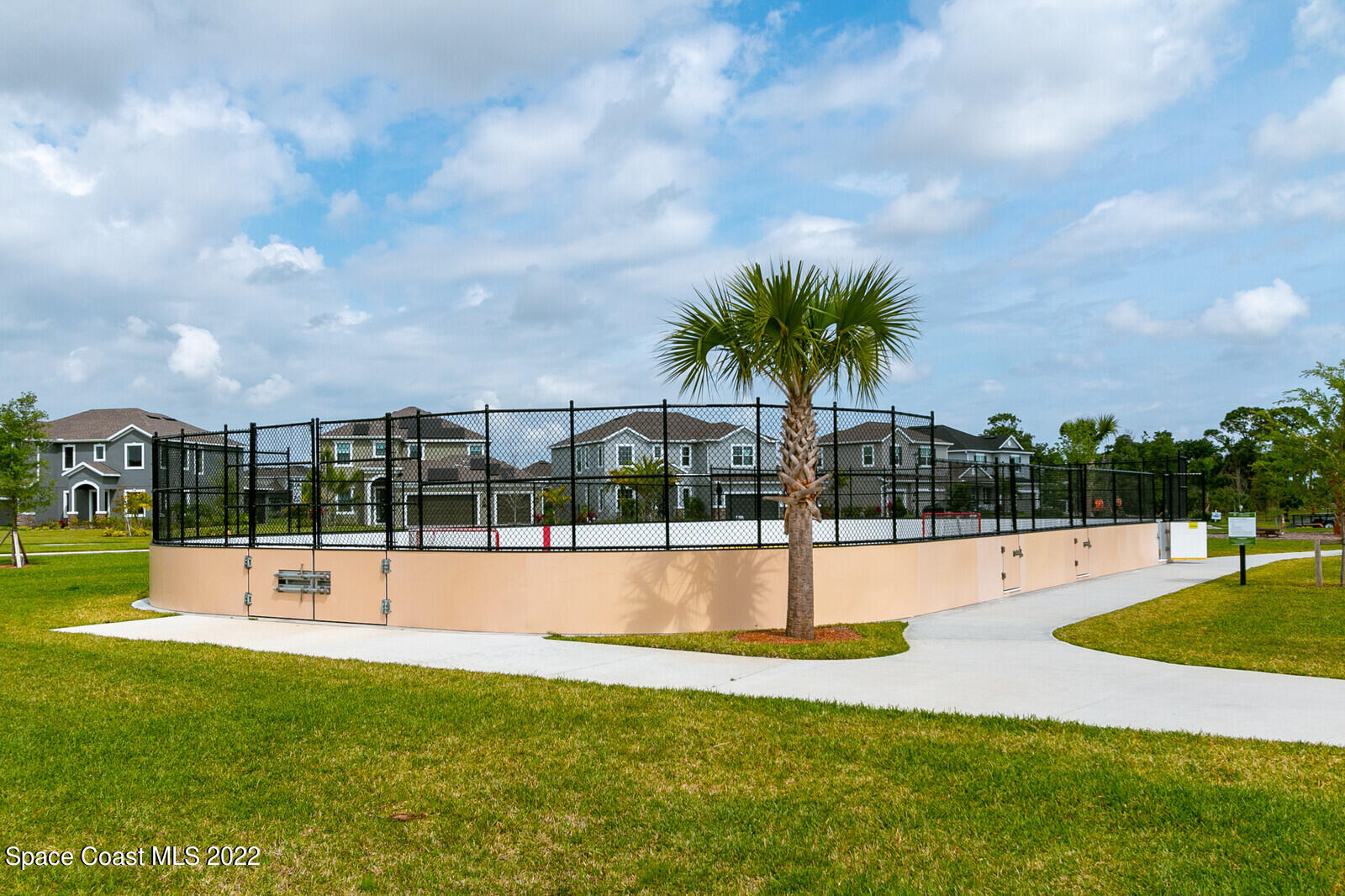 3289 Ribbon Grass Drive Melbourne, FL 32940 - Photo 36 of 58 a view of a swimming pool with a yard and sitting area