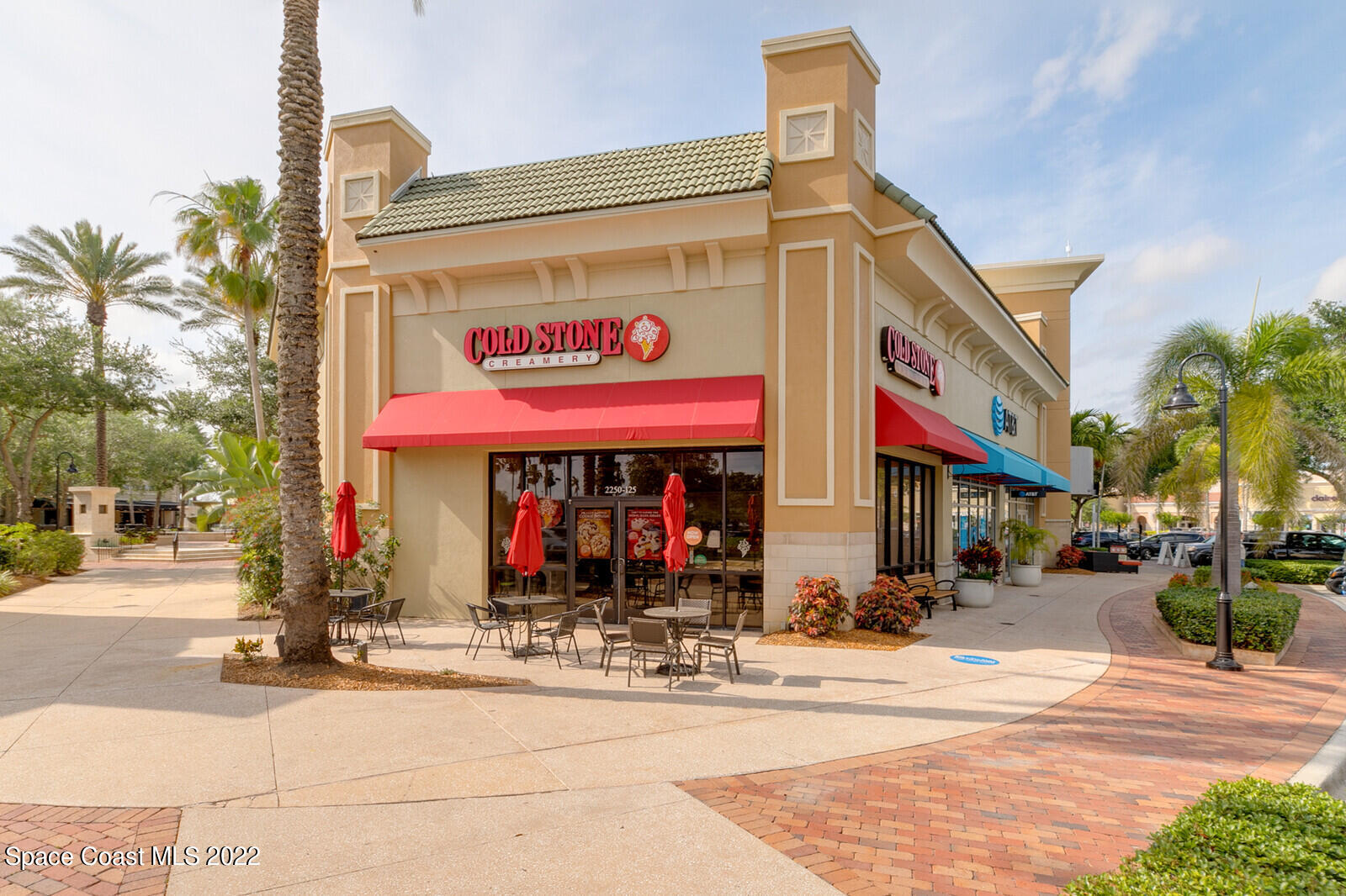 3289 Ribbon Grass Drive Melbourne, FL 32940 - Photo 51 of 58 a view of street with shops on a street