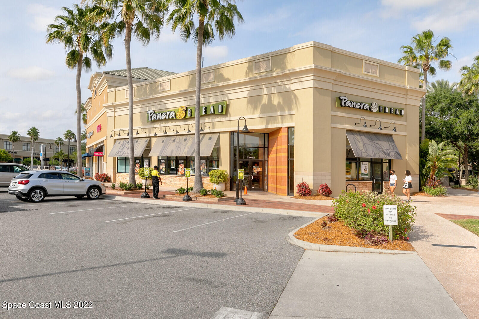 3289 Ribbon Grass Drive Melbourne, FL 32940 - Photo 56 of 58 a front view of a building with