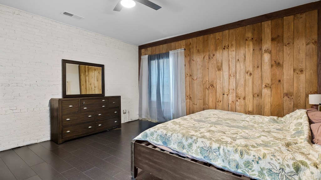 610 Madola Road Epworth, GA 30541 - Photo 13 of 16 a bedroom with a bed and a dresser