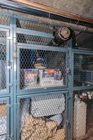 a view of a kitchen with utility area and cabinets