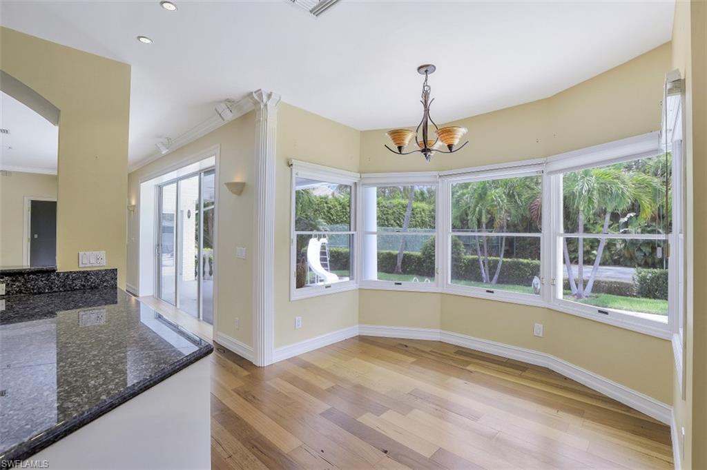 3277 Gordon Drive Naples, FL 34102 - Photo 14 of 33 a view of a kitchen with a sink and a window