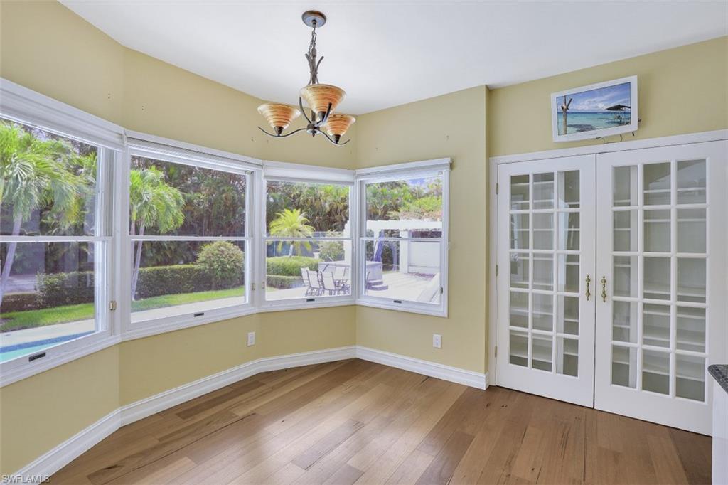 3277 Gordon Drive Naples, FL 34102 - Photo 15 of 33 a view of an empty room with a window