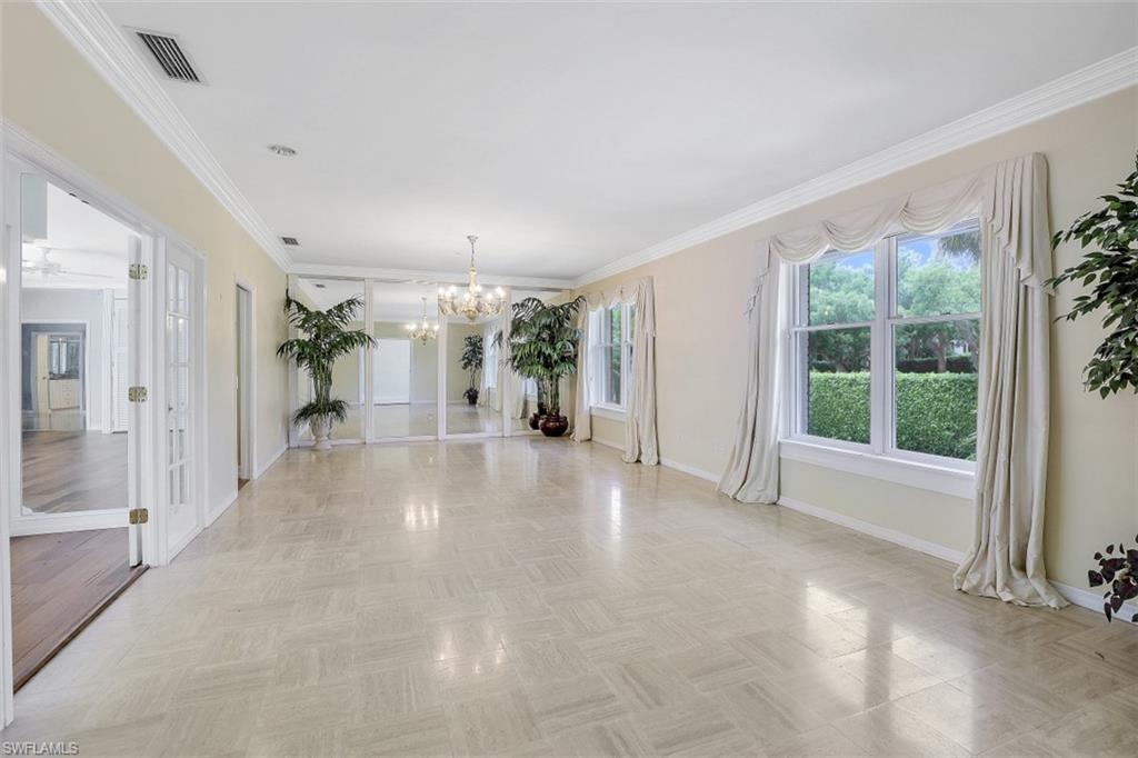 3277 Gordon Drive Naples, FL 34102 - Photo 10 of 33 a view of livingroom with furniture and windows