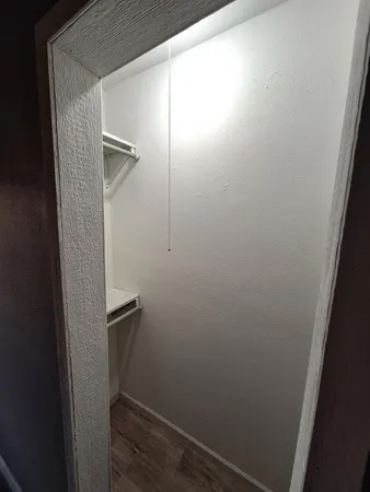 a view of small space with racks on the wall