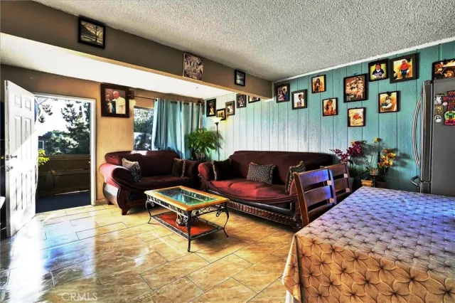 a living room with furniture and window