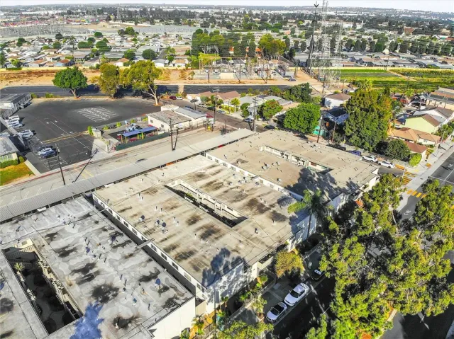 a bathroom with a granite countertop shower and a sink
