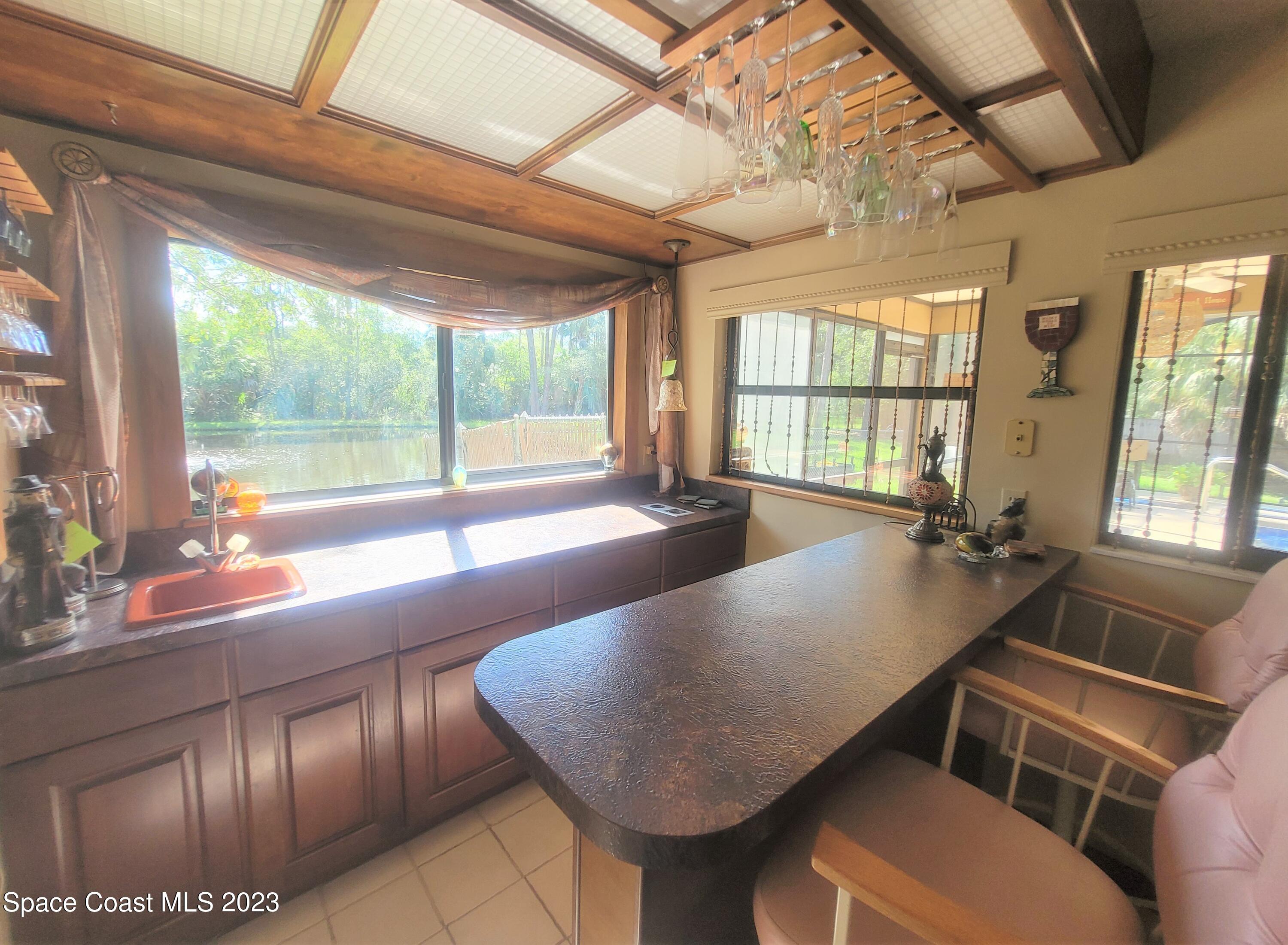 3805 Corey Road Malabar, FL 32950 - Photo 41 of 72 a view of a room with gym equipment