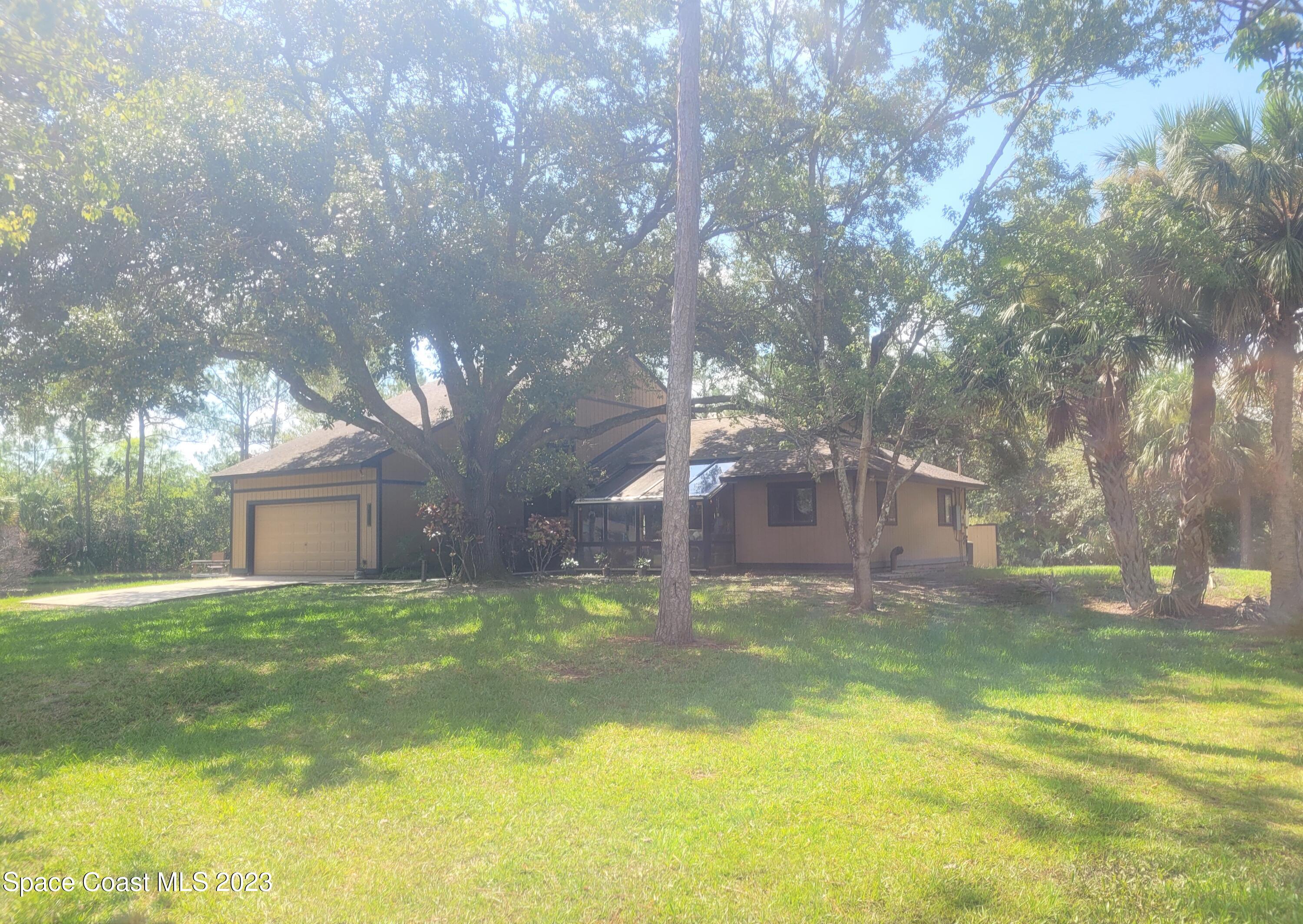 3805 Corey Road Malabar, FL 32950 - Photo 56 of 72 a view of a yard in front of the house
