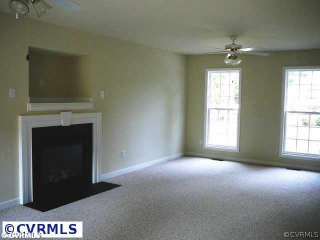 8408 Atlee Road Mechanicsville, VA 23116 - Photo 4 of 10 a view of an empty room with a window
