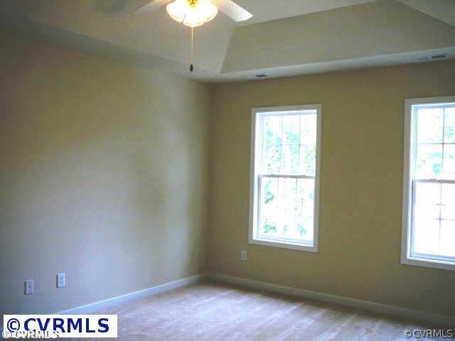8408 Atlee Road Mechanicsville, VA 23116 - Photo 5 of 10 a view of an empty room with a window