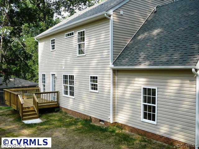 8408 Atlee Road Mechanicsville, VA 23116 - Photo 8 of 10 a view of a house with a balcony