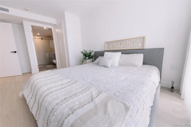 a bathroom with a sink a toilet and bathtub