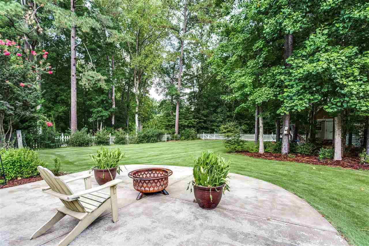 3509 Griffice Mill Road Raleigh, NC 27610 - Photo 19 of 20 Flat backyard and green grass. Perfect for play or entertaining. Backyard