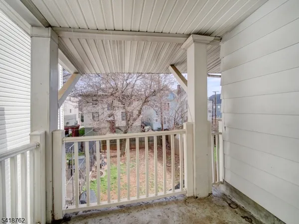a view of a porch with a door
