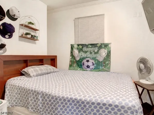 a bedroom with a bed and cabinets