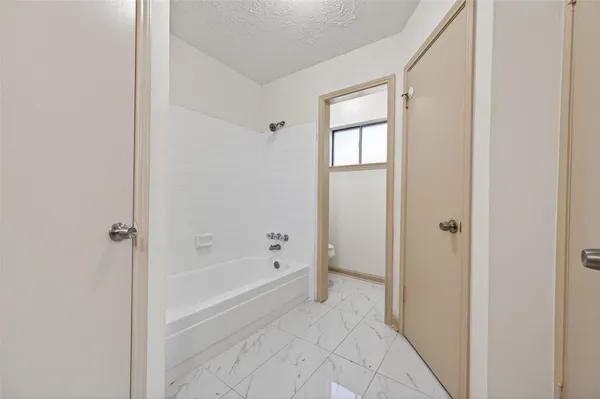 a close view of a bathtub in bathroom