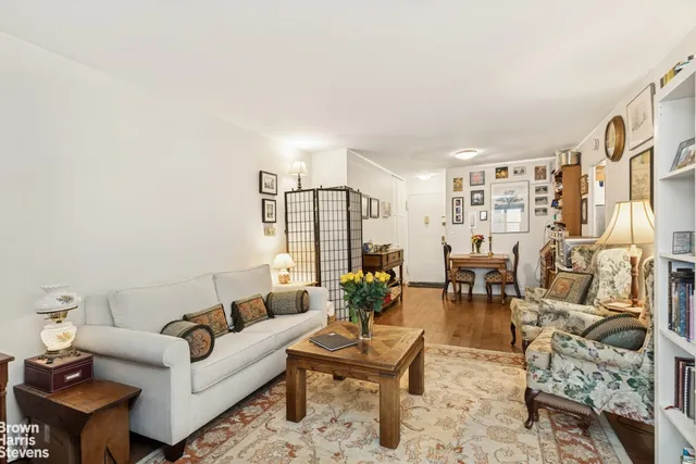 a work room with furniture and a window