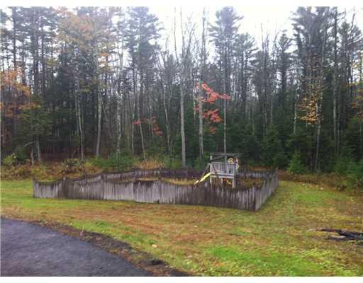 377 Flag Pond Road Saco, ME 04072 - Photo 4 of 25 Exterior Back. Fenced in playground!