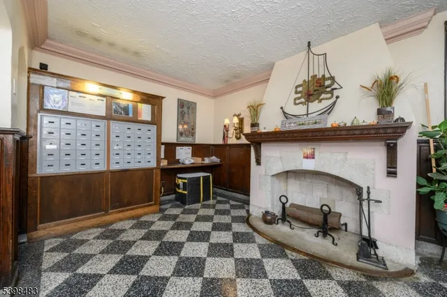 a car parked in front of brick building