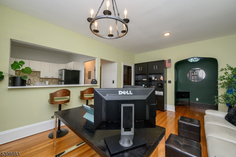 55 Randolph Place, Unit 301 South Orange, NJ 07079 - Photo 9 of 23 a view of kitchen and dining area with furniture