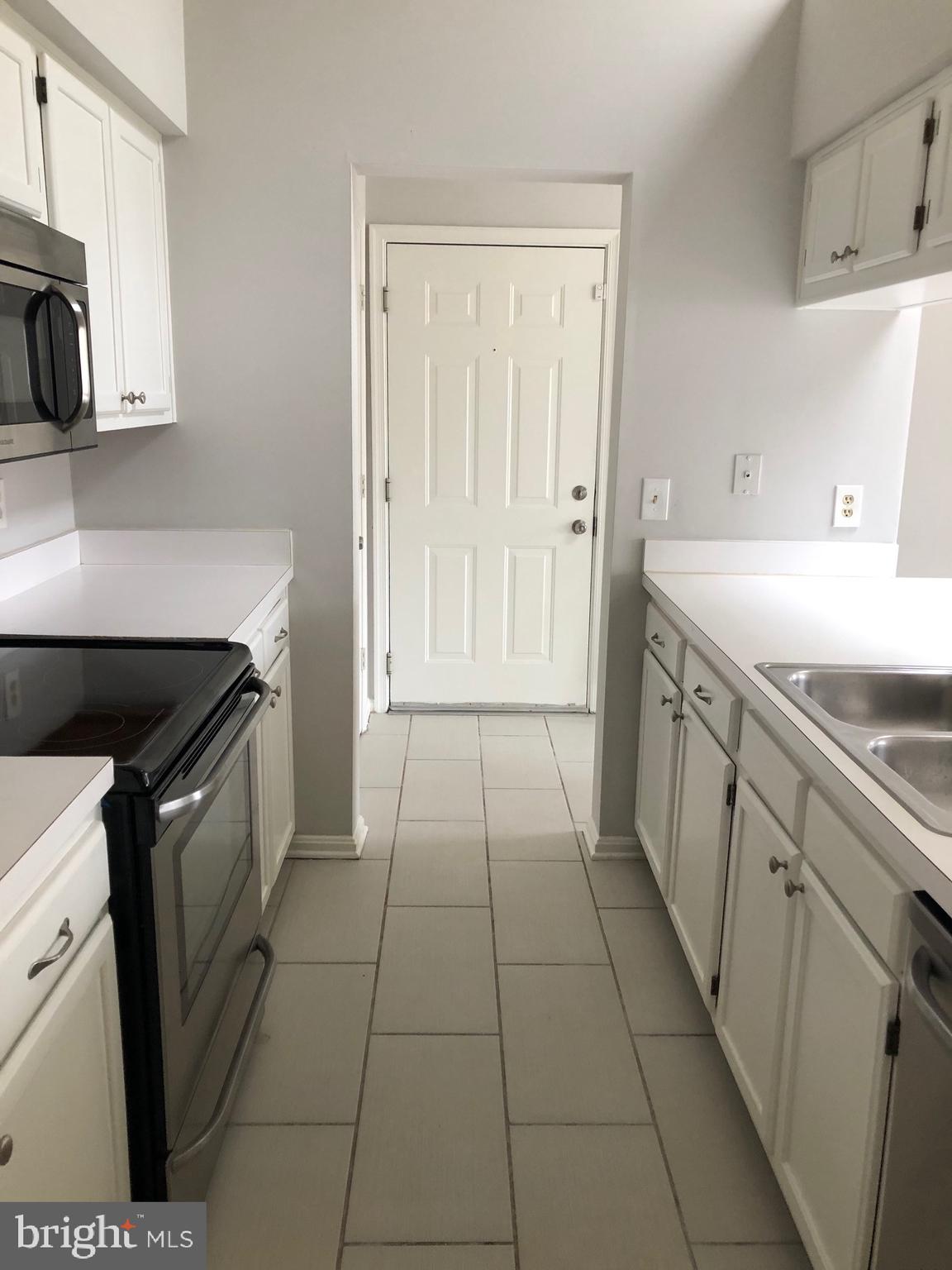 2717 Snowbird Terrace, Unit 1227 Silver Spring, MD 20906 - Photo 4 of 13 Galley Kitchen