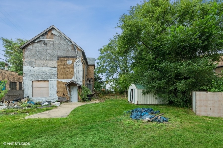 2347 Walnut Street Blue Island, IL 60406 - Photo 10 of 10 a front view of a house with a yard and tree