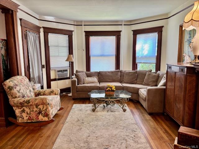 761 East Main Street Riverhead, NY 11901 - Photo 4 of 22 a living room with furniture and a large window