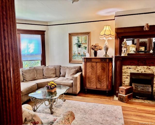 761 East Main Street Riverhead, NY 11901 - Photo 5 of 22 a living room with furniture and a fireplace