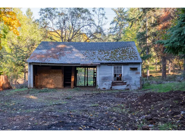 a view of a lake with a yard