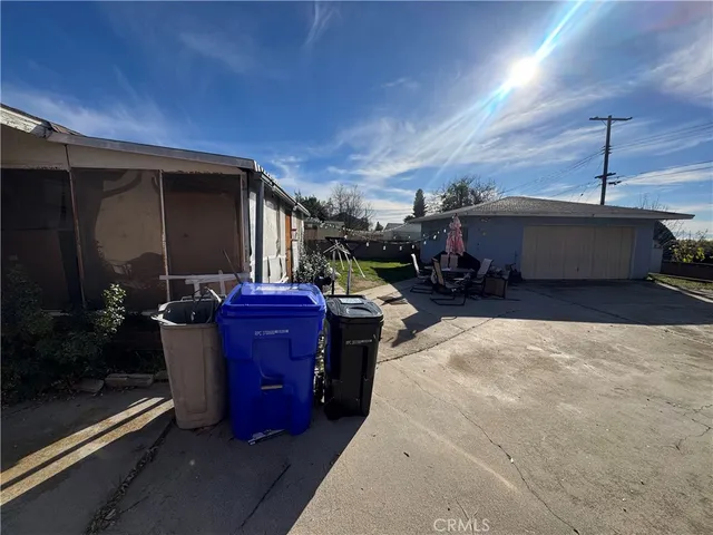 a bed room with a bed and a mirror