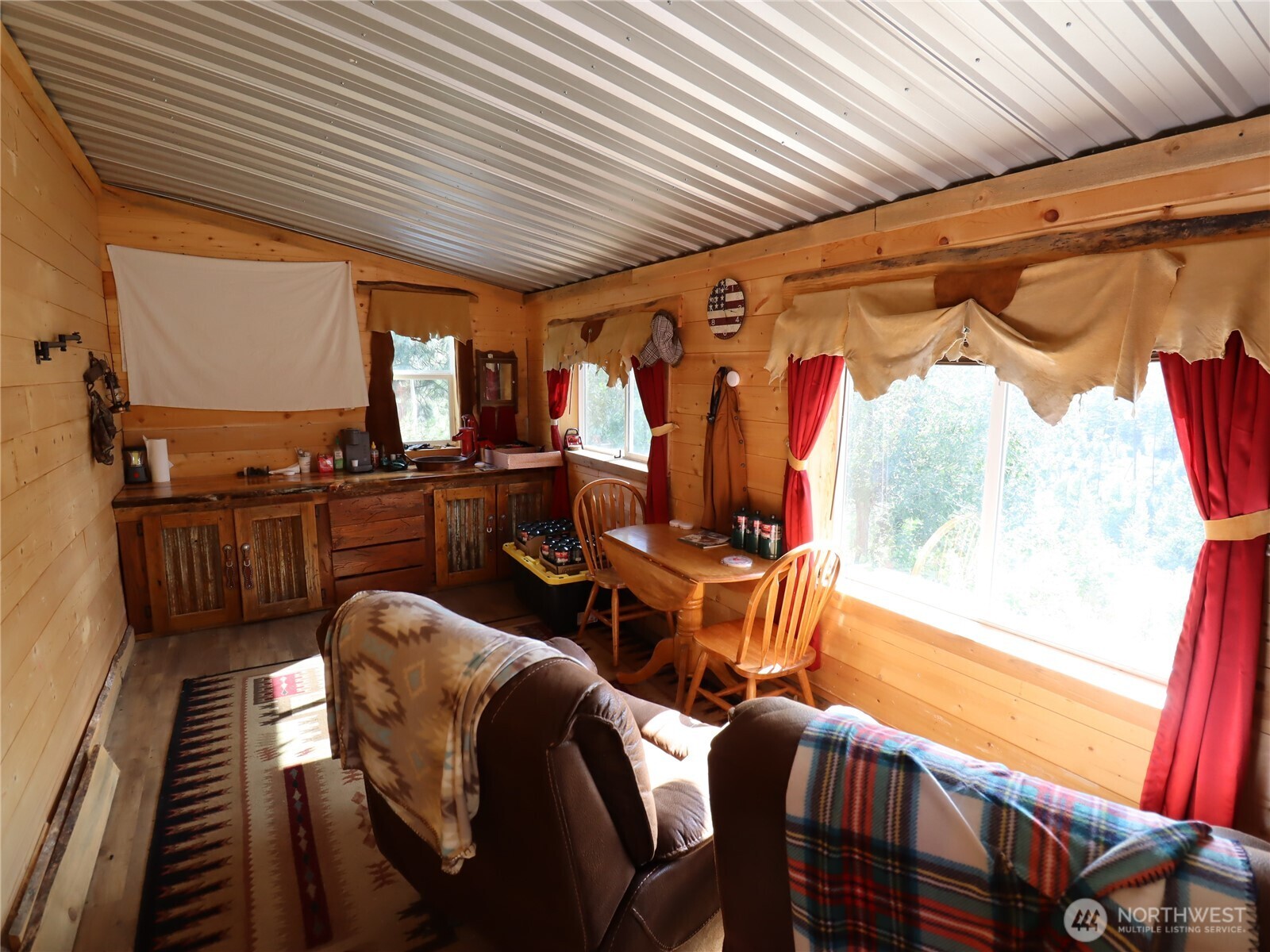 1733 Old CC Road Addy, WA 99101 - Photo 19 of 32 a view of a living room with furniture and a window