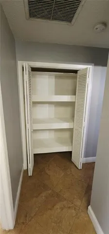 a bathroom with a tub sink and toilet