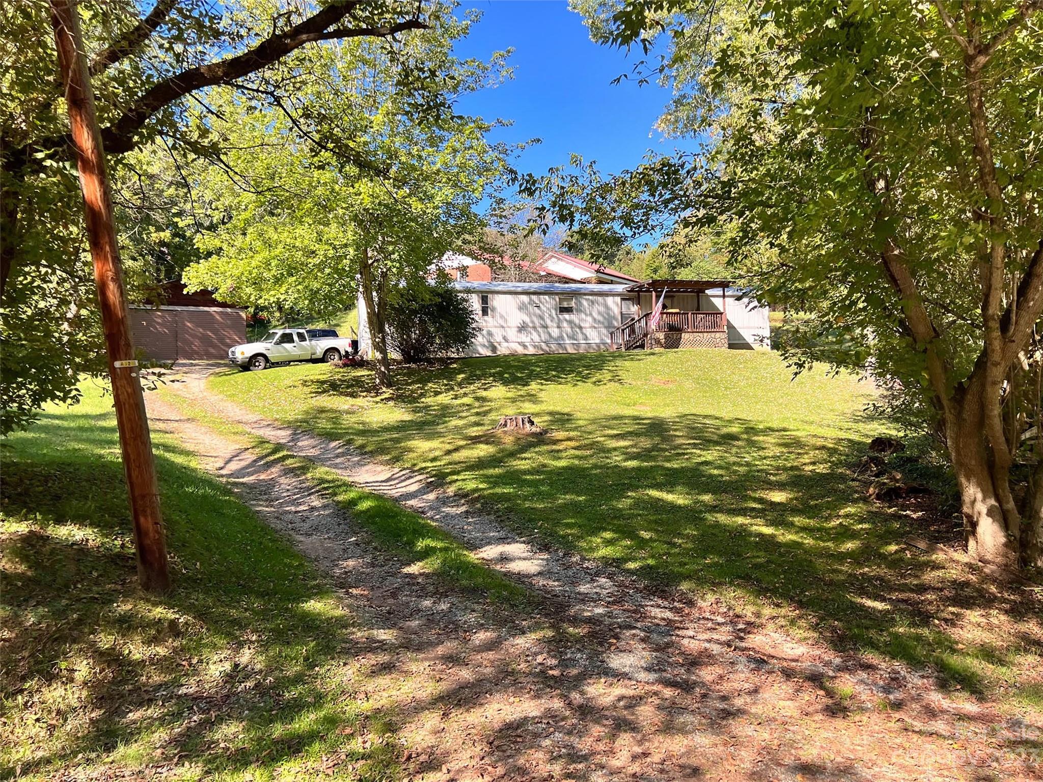 450 Chambers Road Waynesville, NC 28786 - Photo 28 of 28 a view of a yard with an outdoor space