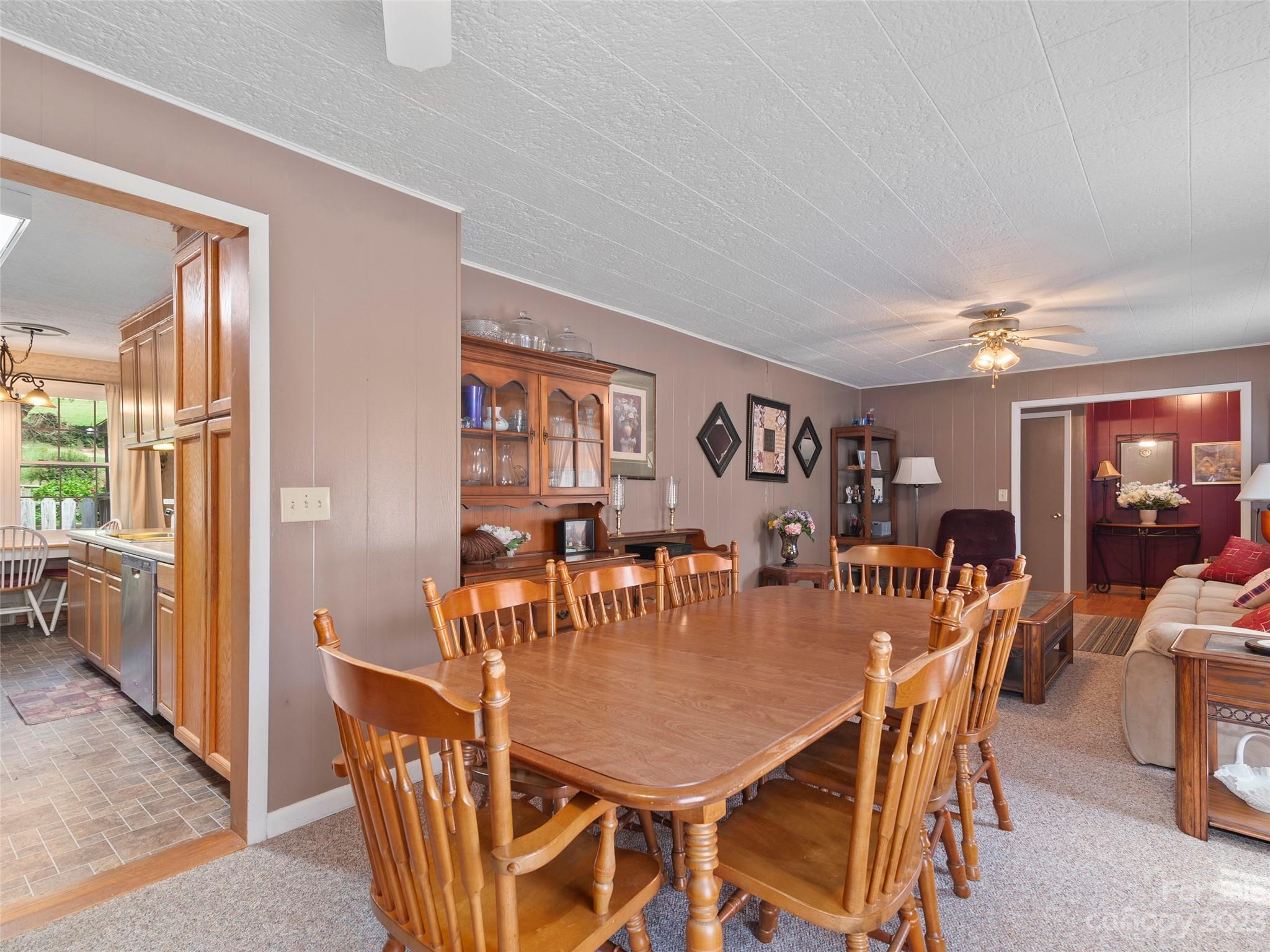 450 Chambers Road Waynesville, NC 28786 - Photo 9 of 28 a dining room with furniture and window