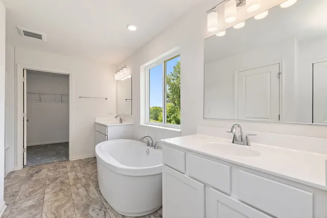 a bathroom with a sink and a bathtub