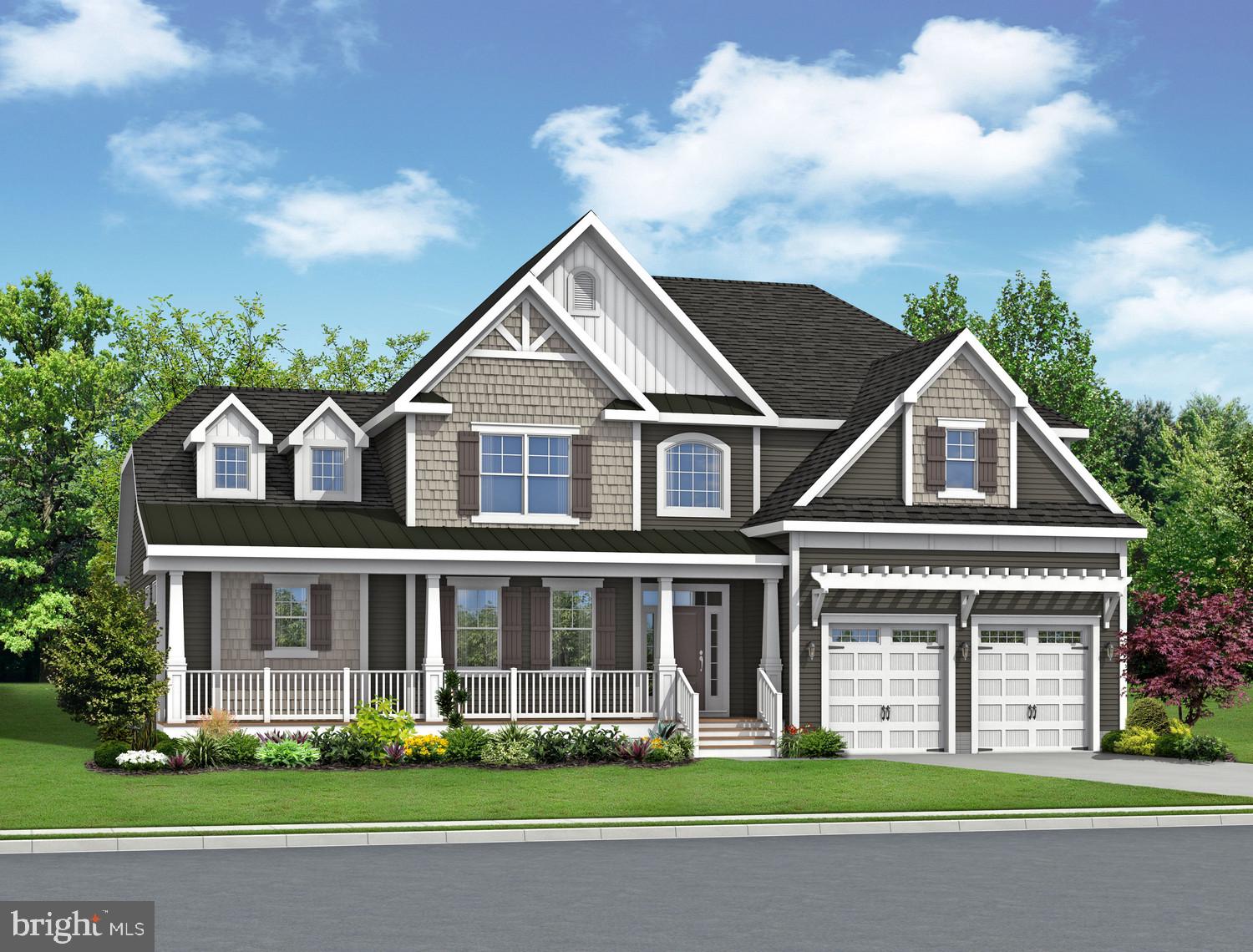 21826 Eastbridge Loop Lewes, DE 19958 - Photo 5 of 27 a front view of a house with a yard