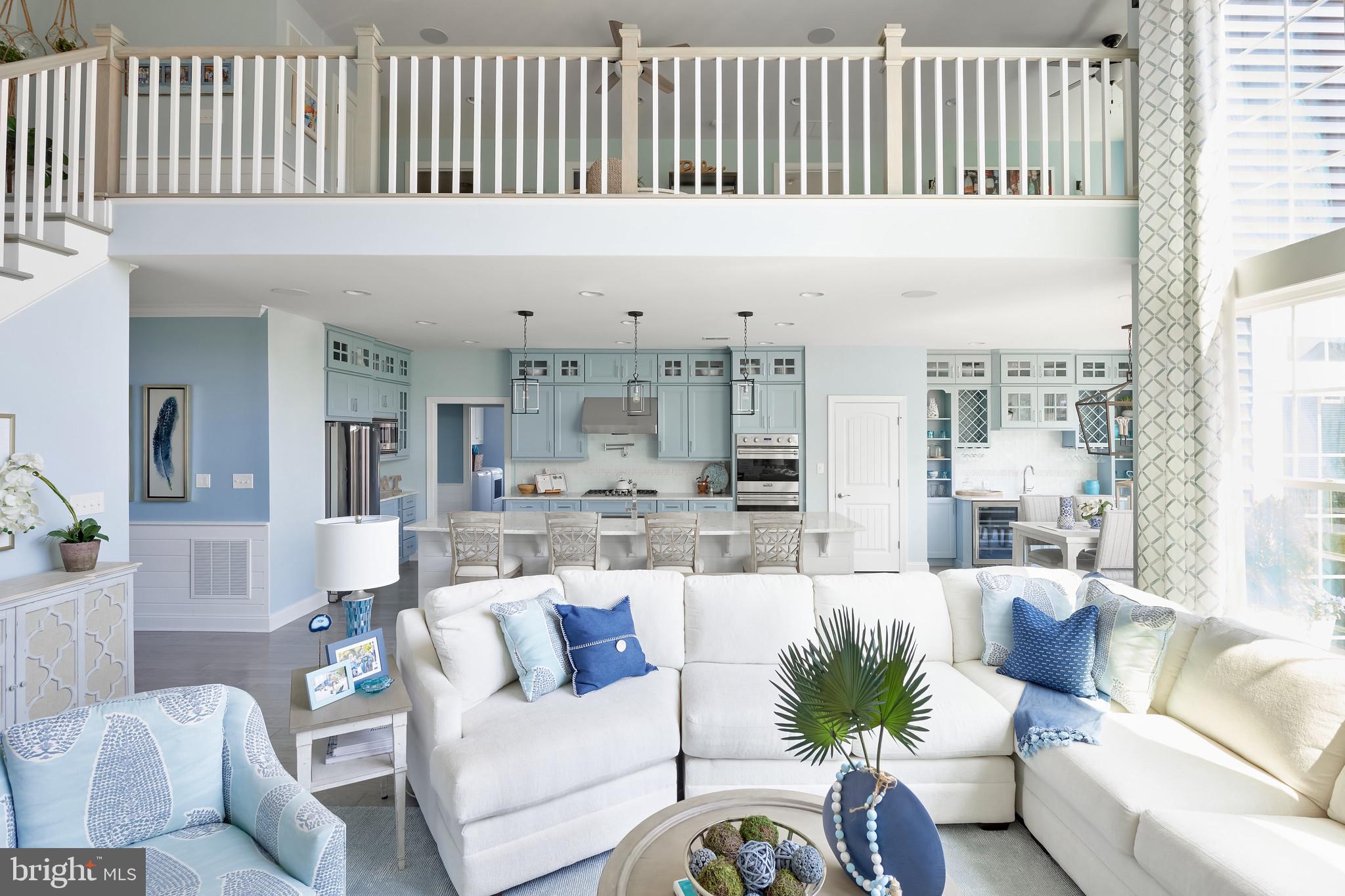 21826 Eastbridge Loop Lewes, DE 19958 - Photo 8 of 27 a living room with furniture