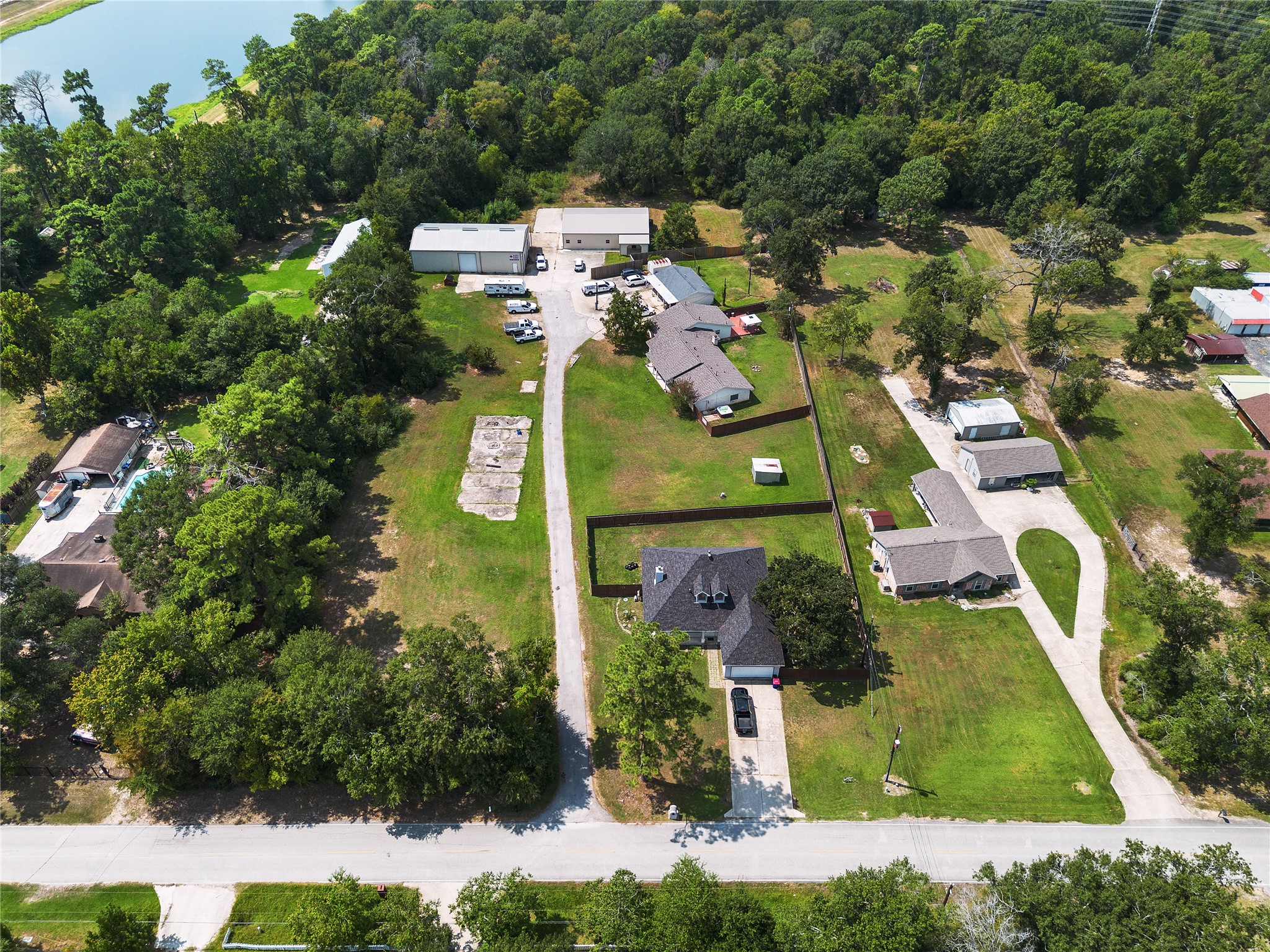 This property offers a unique opportunity for both investors seeking multi-family or mixed-use income, and businesses needing office/warehouse space in the Spring, TX area.